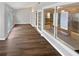 Bright sun room with hardwood floors and large windows, offering abundant natural light at 245 Adena W Ln, Atlanta, GA 30349