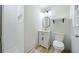 A bathroom features a white vanity, toilet, and a tiled walk-in shower at 3452 Ridgecrest Dr, Powder Springs, GA 30127