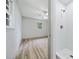A bedroom leads to a bathroom with a tiled walk-in shower and bright natural light at 3452 Ridgecrest Dr, Powder Springs, GA 30127