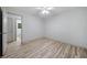 Bedroom features hardwood floors, neutral colored walls, ceiling fan and a connecting bathroom at 3452 Ridgecrest Dr, Powder Springs, GA 30127