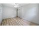 A bedroom boasts wood flooring, a ceiling fan, and access to two entrances at 3452 Ridgecrest Dr, Powder Springs, GA 30127