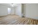 Bedroom with hardwood floors, neutral colored walls, ceiling fan, and natural lighting at 3452 Ridgecrest Dr, Powder Springs, GA 30127