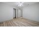 Bedroom with hardwood floors, neutral colored walls, closet and natural lighting at 3452 Ridgecrest Dr, Powder Springs, GA 30127