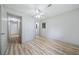 This bedroom boasts wood flooring, a ceiling fan, and access to other rooms at 3452 Ridgecrest Dr, Powder Springs, GA 30127