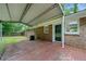 A covered patio with a wooden deck provides an ideal space for outdoor dining and relaxation at 3452 Ridgecrest Dr, Powder Springs, GA 30127
