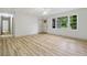 Well-lit living room featuring plank floors and natural light at 3452 Ridgecrest Dr, Powder Springs, GA 30127