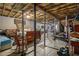 Large unfinished basement with exercise equipment, exposed ceiling and tile floor at 6436 Alpine Rd, Rex, GA 30273