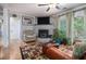 Open-concept living space, highlighting the cozy fireplace and seamless flow at 6436 Alpine Rd, Rex, GA 30273