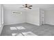 Spacious bedroom with neutral walls, plush carpet, and bright windows at 1002 Coleman Sw St, Atlanta, GA 30310