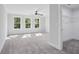 Sun-filled bedroom with closet, large windows and neutral carpeting at 1002 Coleman Sw St, Atlanta, GA 30310