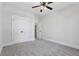 Carpeted bedroom featuring double closets and neutral paint at 1002 Coleman Sw St, Atlanta, GA 30310