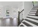 Entryway with dark wood flooring and staircase at 1002 Coleman Sw St, Atlanta, GA 30310