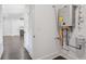 Utility room featuring a tankless water heater at 1002 Coleman Sw St, Atlanta, GA 30310