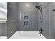 Bathroom features gray tiled shower with built in shelves and bronze hardware at 2008 Falcon Glen Ct, Alpharetta, GA 30022