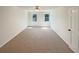 Spacious bedroom showcasing neutral carpet, a ceiling fan and natural light from two windows at 2907 Clearbrook Dr, Marietta, GA 30068