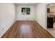 Bright, spacious dining area features wood-look floors and adjacent kitchen access at 2907 Clearbrook Dr, Marietta, GA 30068