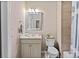 Bathroom features tile shower and tub, toilet, vanity and lighting at 3105 Neal Ct, Cumming, GA 30041