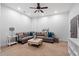 Spacious living room with plush seating, a ceiling fan, and recessed lighting at 3105 Neal Ct, Cumming, GA 30041