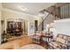 Inviting foyer with hardwood floors, staircase and dining room, perfect for greeting guests at 320 Town Center Ave # U206B, Suwanee, GA 30024