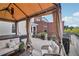 Rooftop patio with plenty of plants, comfortable seating, and an overhead cover at 320 Town Center Ave # U206B, Suwanee, GA 30024