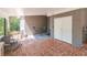 Charming back porch with brick flooring and chairs, a cozy outdoor space at 3860 Carlton Dr, Atlanta, GA 30341