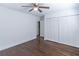 Spacious bedroom featuring hardwood floors, closet, and modern interior decor at 3860 Carlton Dr, Atlanta, GA 30341