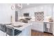 Updated kitchen featuring stainless steel appliances, breakfast bar, and modern pendant lighting at 3860 Carlton Dr, Atlanta, GA 30341
