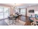 Open-concept living room featuring modern decor and hardwood floors at 3860 Carlton Dr, Atlanta, GA 30341