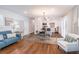 Open concept living space with modern décor and adjacent kitchen at 3860 Carlton Dr, Atlanta, GA 30341