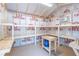 Interior of storage shed with shelving and work benches at 3860 Carlton Dr, Atlanta, GA 30341