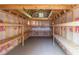 Interior view of a storage shed with wooden shelves and a vaulted ceiling at 3860 Carlton Dr, Atlanta, GA 30341