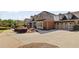 Beautiful home exterior with a well-manicured lawn and ample parking space at 2550 Ballantrae Cir, Cumming, GA 30041
