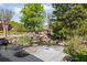 Scenic water feature with natural stone, waterfall, and surrounding landscaping at 2550 Ballantrae Cir, Cumming, GA 30041
