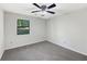 Clean bedroom with neutral walls and a ceiling fan at 325 Summertown Dr, Stockbridge, GA 30281