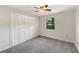 Comfortable bedroom with ample closet space and a ceiling fan at 325 Summertown Dr, Stockbridge, GA 30281