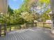 Multi-level wood deck overlooks a tree-filled backyard, perfect for outdoor entertaining or relaxing at 325 Summertown Dr, Stockbridge, GA 30281