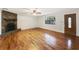 Spacious living room with hardwood floors and stone fireplace at 325 Summertown Dr, Stockbridge, GA 30281
