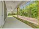 Spacious back porch with ceiling fans at 5224 W Mountain St, Stone Mountain, GA 30083