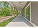 Spacious back porch with ceiling fans at 5224 W Mountain St, Stone Mountain, GA 30083