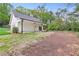 Newly built house with charming design, wooden posts and fresh green grass in yard at 5224 W Mountain St, Stone Mountain, GA 30083