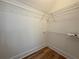 Walk-in closet with wood-look flooring and wire shelving for organizing at 5567 Tyree Rd, Winston, GA 30187