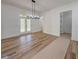 Open dining area featuring hardwood floors, recessed lighting, and exterior access at 5567 Tyree Rd, Winston, GA 30187