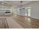 Open-concept living space showcasing hardwood floors, recessed lights, and exterior access at 5567 Tyree Rd, Winston, GA 30187