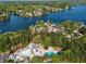Aerial view of lake community with access to resort style pool and lake access at 6360 Spinnaker Ln, Alpharetta, GA 30005