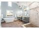 Elegant bathroom with a soaking tub, a glass-enclosed shower, and stylish fixtures and finishes at 6360 Spinnaker Ln, Alpharetta, GA 30005