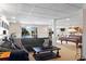 Basement recreation area with comfortable seating and views of the lake at 6360 Spinnaker Ln, Alpharetta, GA 30005