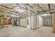 Spacious unfinished basement with insulated ceiling and partially framed walls at 1140 Hubbard Sw St, Atlanta, GA 30310