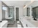Bathroom featuring double sinks, walk-in glass shower with a soaking tub at 1140 Hubbard Sw St, Atlanta, GA 30310