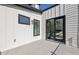 Back patio features French doors to the main bedroom allowing for seamless indoor/outdoor living at 1140 Hubbard Sw St, Atlanta, GA 30310