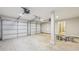 Spacious three car garage with automatic doors, storage area, and access to the home at 1140 Hubbard Sw St, Atlanta, GA 30310